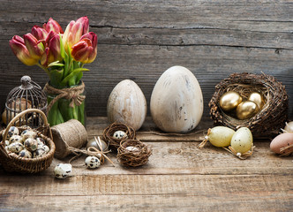 vintage easter decoration with eggs and red tulip flowers