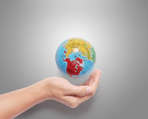 Globe earth in human hand