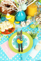 Serving Easter table with tasty dishes close-up