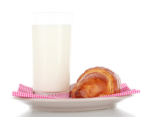 Croissant and glass of milk isolated on white