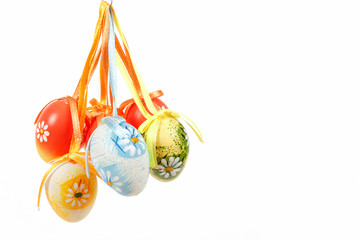 hanged bright color easter eggs with bows