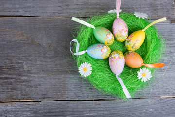 Easter eggs on wooden background