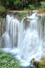 Naklejka na ściany i meble Deep forest Waterfall in Kanchanaburi, Thailand