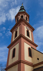 Fototapeta na wymiar Tower of Holy Cross church (circa XVII c.).Offenburg, Germany