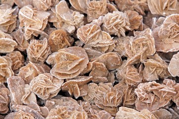 background of desert rose calls stones gathered in North africa