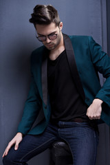 sexy fashion male model dressed elegant - casual posing