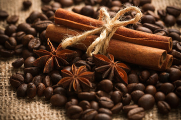 cinnamon rolls with roasted coffee beans. macro