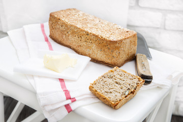 Home baked wholemeal bread with seed - obrazy, fototapety, plakaty