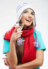 Winter hat and red scarf on young happy woman.