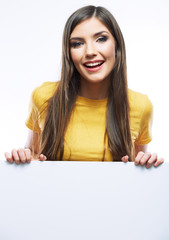 Young smiling woman show blank board.