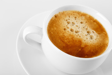 A cup of delicious espresso coffee on a white background