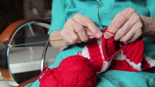 knitting hands of old woman