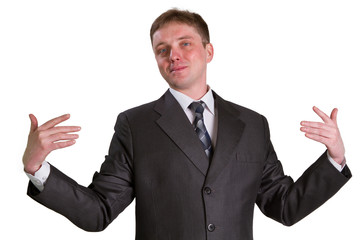 Young businessman posing in a suit