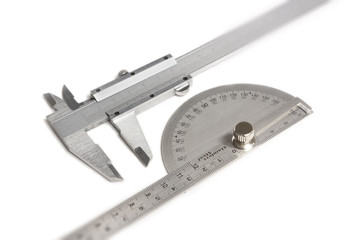 Vernier calipers and protractor isolated on white