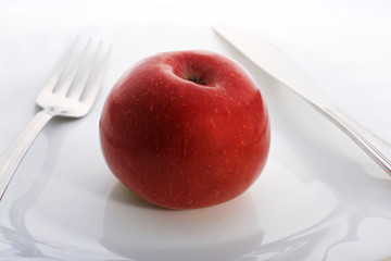 Apple on the plate.