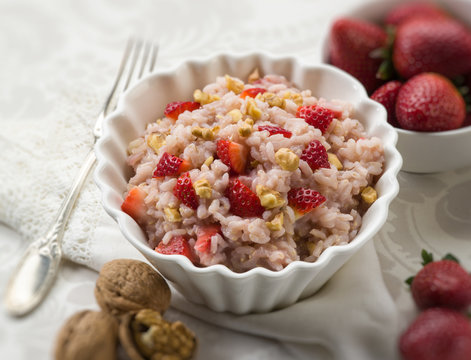 risotto with strawberries and nuts, selective focus