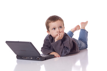 Cute boy with a laptop