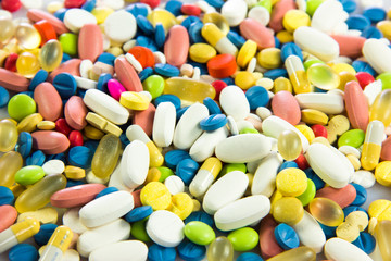 background made of colorful pills.