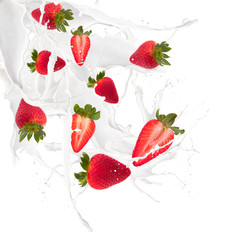 Strawberries in milk splash, isolated on white background 