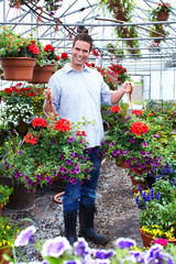 Man working in nursery.