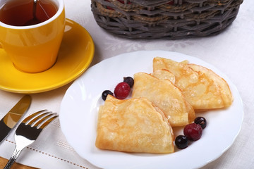 Fried pancakes with fruit