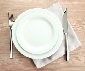Table setting on wooden table