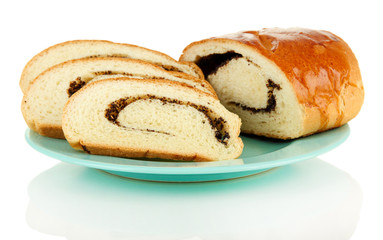 Loaf with poppy seeds on color plate, isolated on white