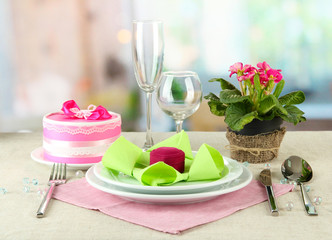 Romantic table serving on bright background