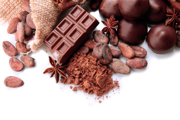 Composition of chocolate sweets, cocoa and spices, isolated