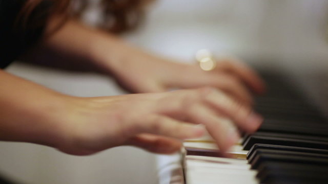 Woman playing the piano.