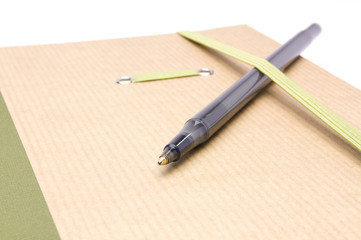 notebook with a pen for notes