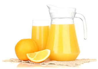 Full glass and jug of orange juice and oranges isolated on
