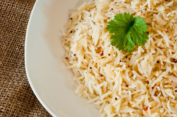 Warm Cooked rice on a white plate