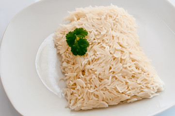 Cooked rice on a white plate