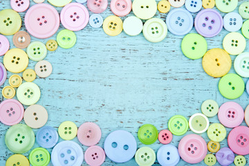 Pastel color buttons on a blue background