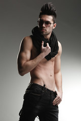 sexy fashion man model top naked posing dramatic in the studio