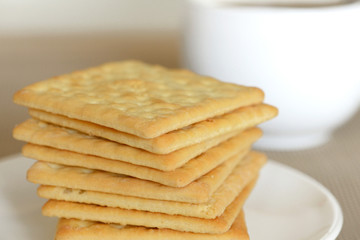 Close-up of cream cracker cookie