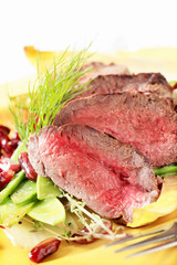 Roast beef with vegetable garnish