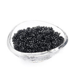 black caviar in a glass bowl isolated on a white background