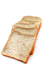 Whole wheat bread on white background