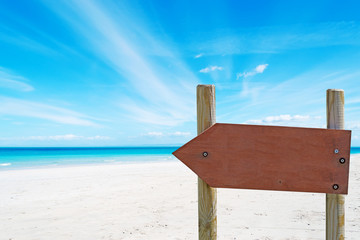 arrow sign at the beach