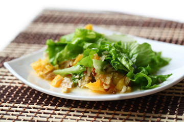 Salad with chicken, oranges, honey and almonds