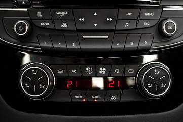 Fototapeta premium Main dashboard of an autovehicle, interior-central view