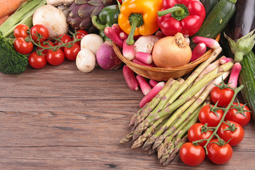 healthy organic vegetables on a wood background