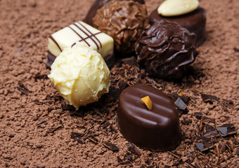 chocolate background with group of  pralines