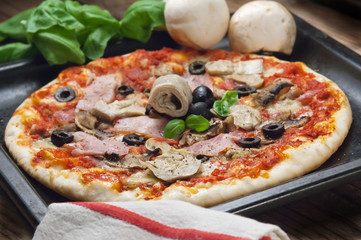 Pizza capricciosa ham olives and artichokes