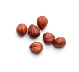 Hazelnuts on a white neutral background