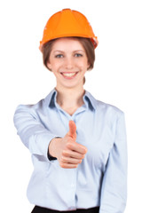Girl in a protective helmet shows that all okay