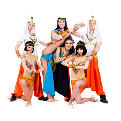 dancers dressed in Egyptian costumes posing