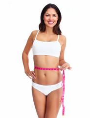 Fototapeta premium Beautiful healthy woman with a measuring tape.